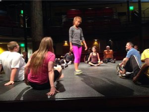 Actors warming up on stage
