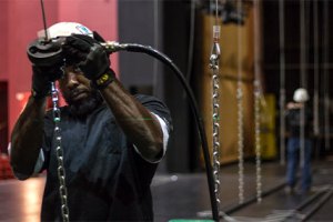 PUI employee performing rigging terminations.